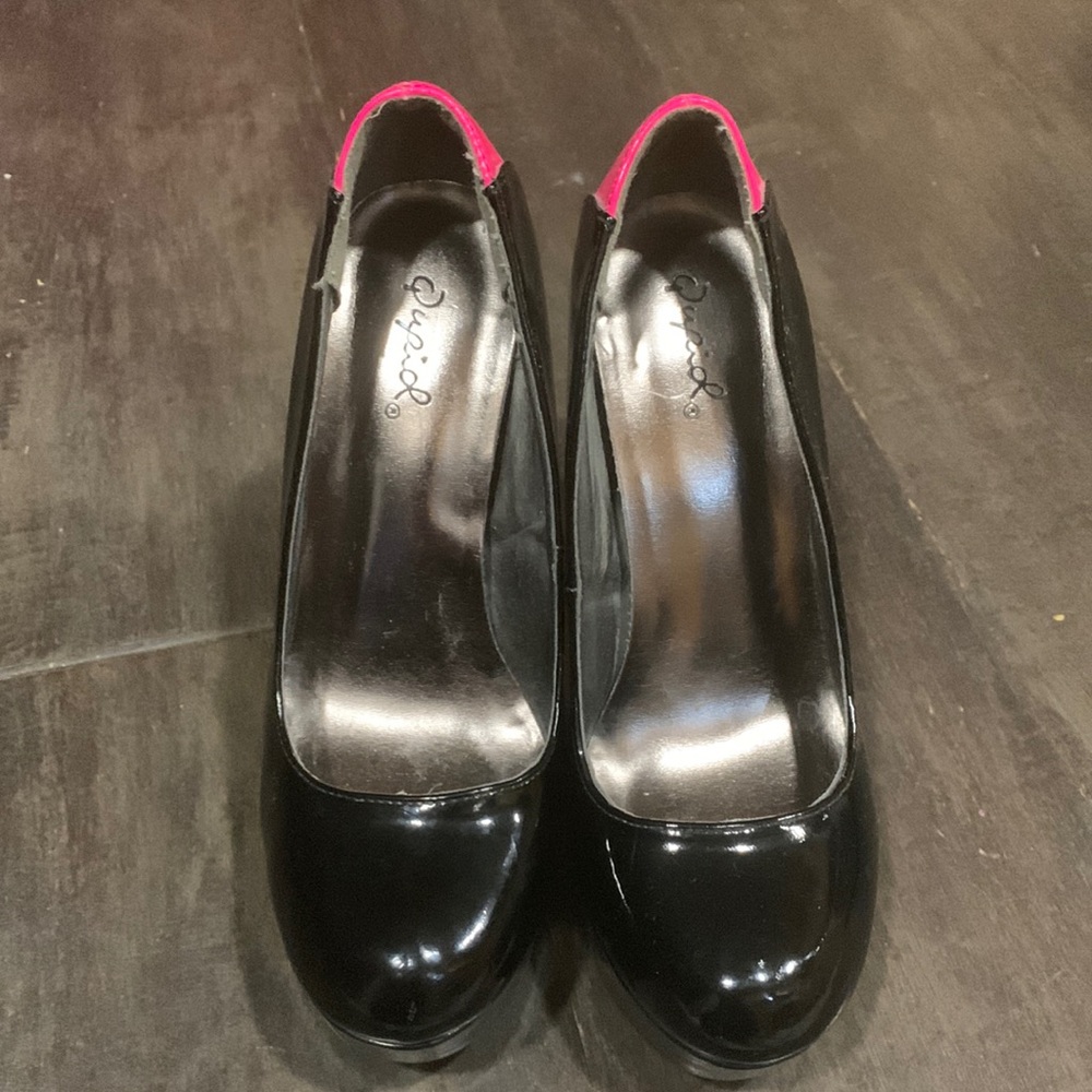 Black and hot pink high heels